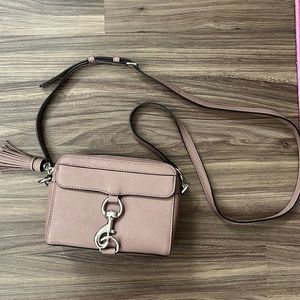 Crossbody bag with buckle front